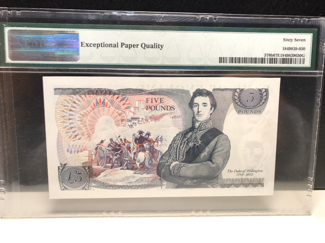 《外钞收藏家》第七十四期拍卖 英国D序列5镑 pmg67