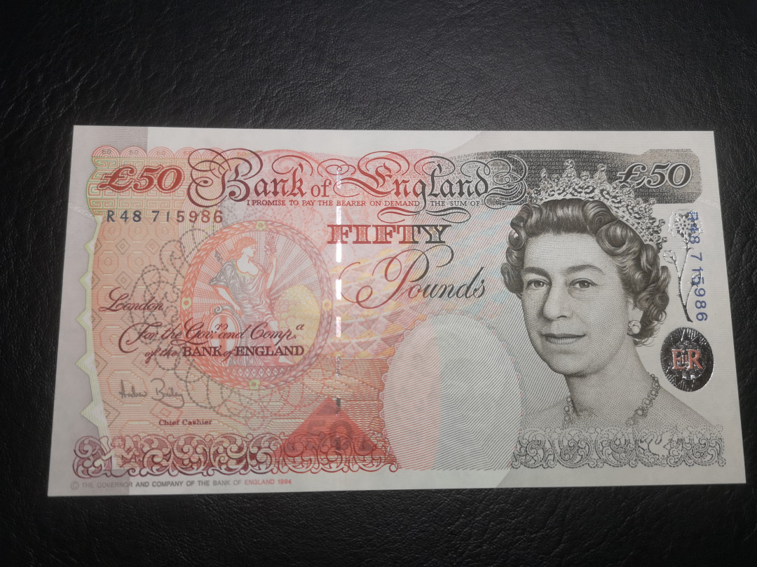 《外钞收藏家》第七十四期拍卖 英镑E序列50镑 绝品 凹版非常好的一张