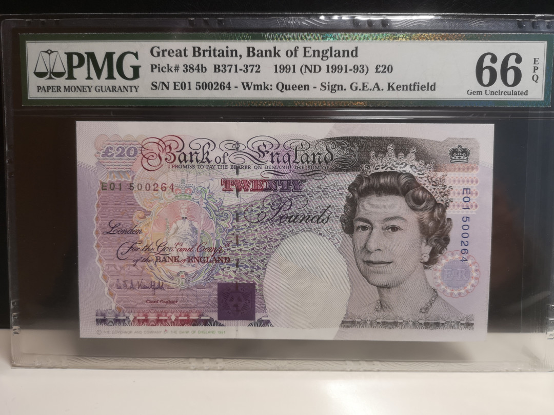 《外钞收藏家》第七十四期拍卖 英国E序列20镑 D序列10镑 全同号 同签名两张 pmg66
