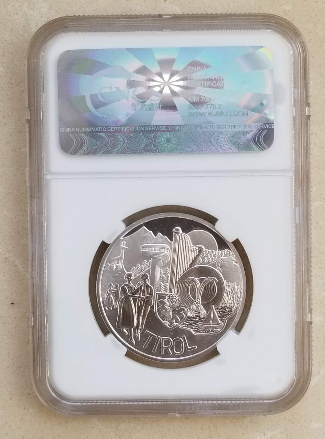 【币观天下】第九十六期钱币拍卖 奥地利2014年联邦州蒂罗尔10元精制银币，信泰评级封装。
