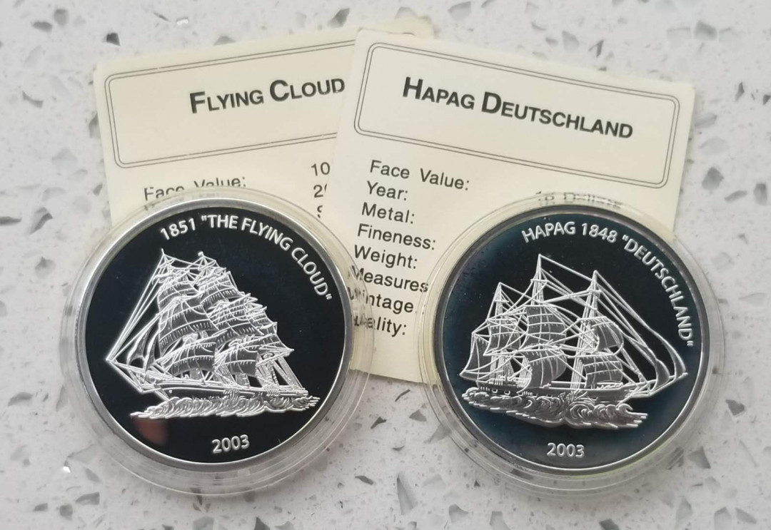 【币观天下】第九十六期钱币拍卖 利比里亚2003年飞云号和德意志号海船纪念银币两枚