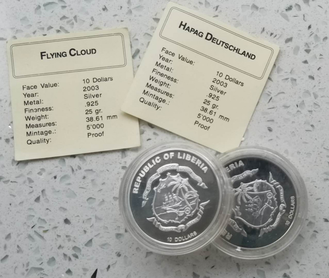 【币观天下】第九十六期钱币拍卖 利比里亚2003年飞云号和德意志号海船纪念银币两枚