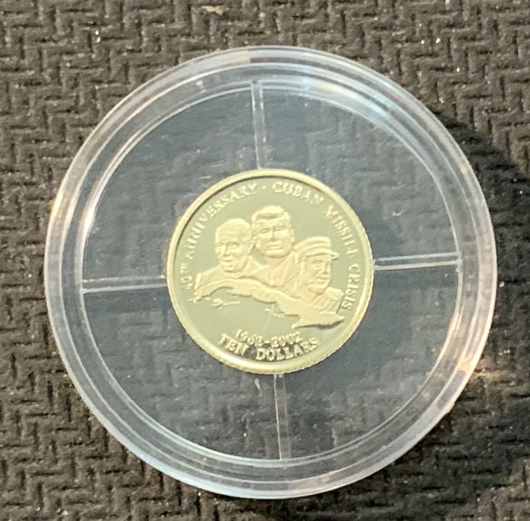 紫瑗钱币—微拍第13期 —批发场 利比里亚 2001年 卡斯特罗访问40周年 10元 0.5克 0.585金