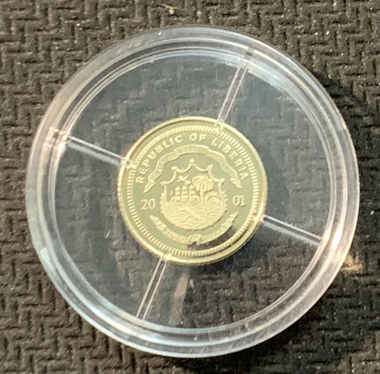 紫瑗钱币—微拍第13期 —批发场 利比里亚 2001年 卡斯特罗访问40周年 10元 0.5克 0.585金