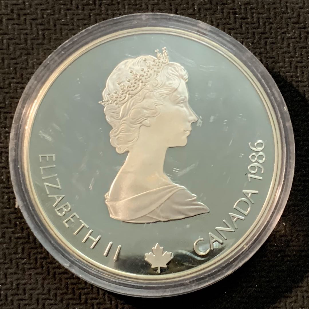 紫瑗钱币—微拍第14期  加拿大 1986年 卡尔加里冬奥会 卧射 20元  34.1克 0.925银 精制