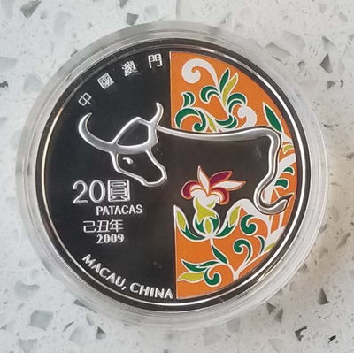 【随心拍&Getcoins】现代钱币拍卖第四十四期 澳门2009年生肖牛彩色纪念银币 1盎司，带证书包装。