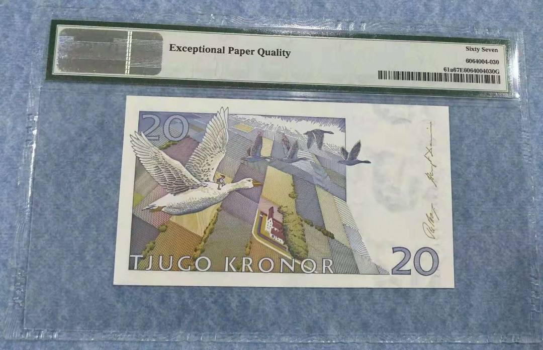 【鲸贝乐淘】千字文·第“有虞陶唐”号拍卖 【瑞典🇸🇪 】1991年20元，骑鹅环游，PMG67E 