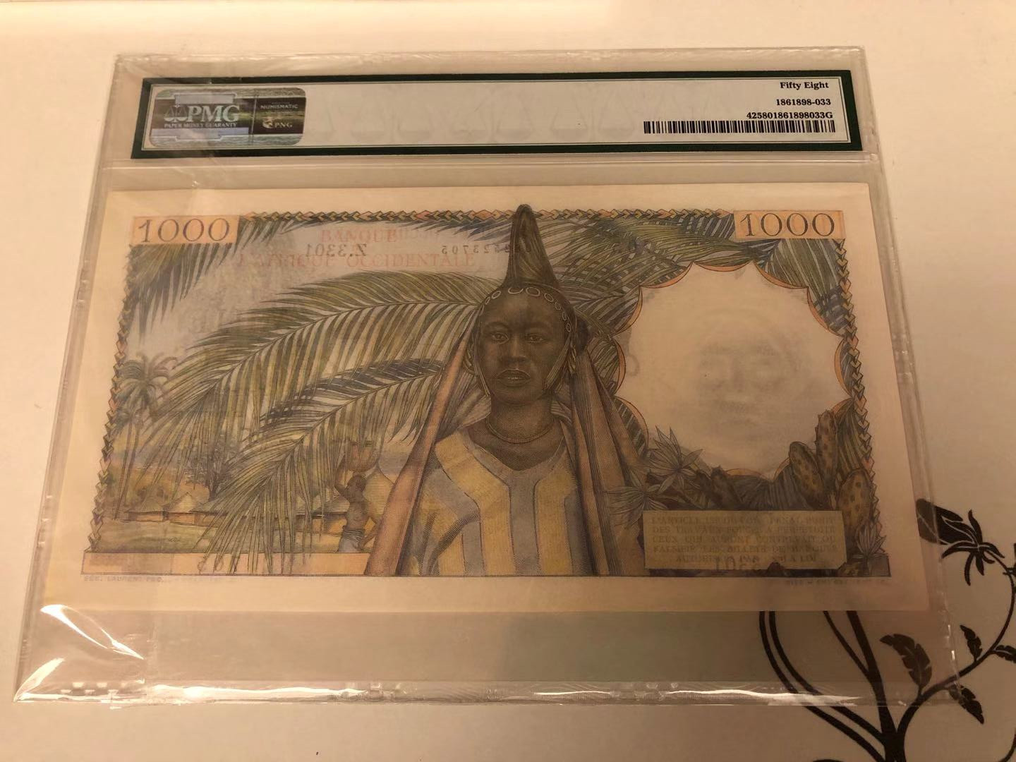 【收藏联盟】第115期拍卖（2020新年第一拍）——黑美人 法属西非 1945-54年 1000法郎 p42 PMG58 稀少