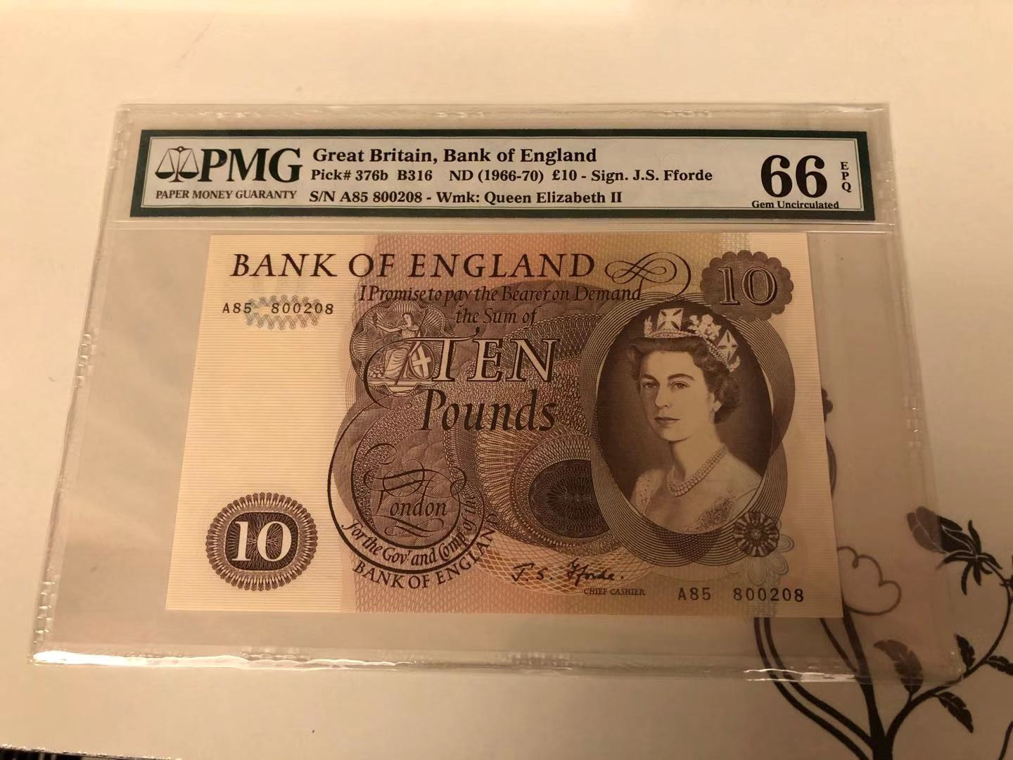 【收藏联盟】第115期拍卖（2020新年第一拍）——黑美人 英国C序列 1966-70年 10镑 PMG66EPQ  J. S. Fforde签名 女王纸币 狮徽