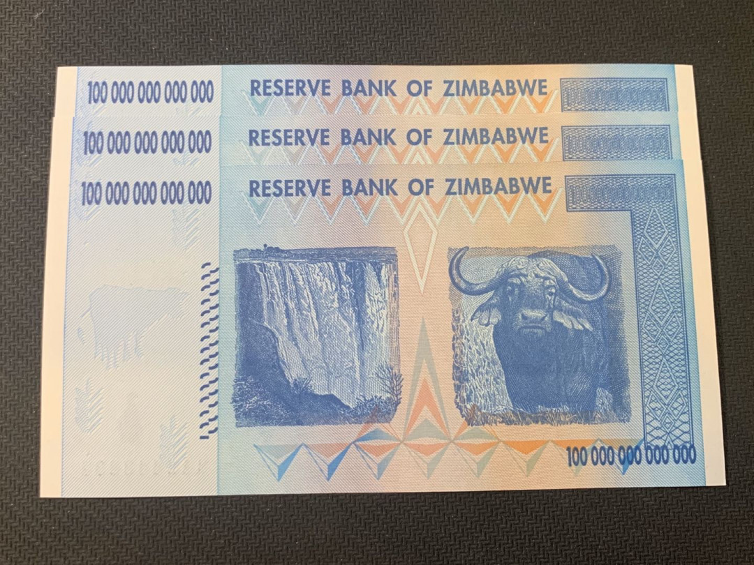 紫瑗钱币—微拍第18期 纸币团购场 津巴布韦 2008年 100万亿 世界面值最大纸币 3联号 （冠号AA2448835—37）