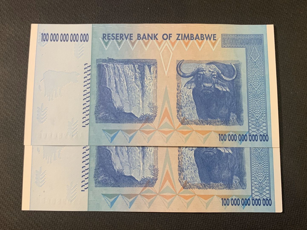 紫瑗钱币—微拍第18期 纸币团购场 津巴布韦 2008年 100万亿 世界面值最大纸币 2联号 （冠号AA0980004—05）