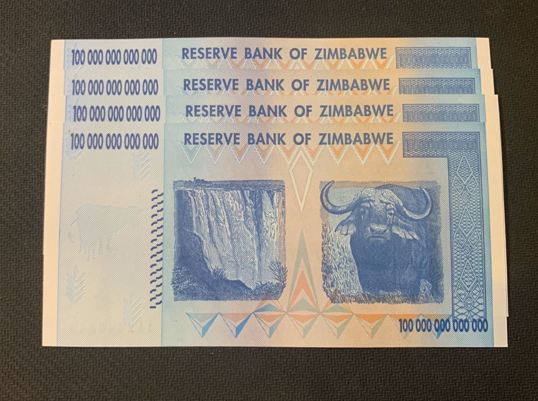 紫瑗钱币—微拍第18期 纸币团购场 津巴布韦 2008年 100万亿 世界面值最大纸币 4连号（冠号AA2448840—43）