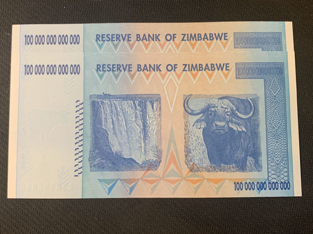 紫瑗钱币—微拍第18期 纸币团购场 津巴布韦 2008年 100万亿 世界面值最大纸币 2联号 （冠号AA2173559—60）