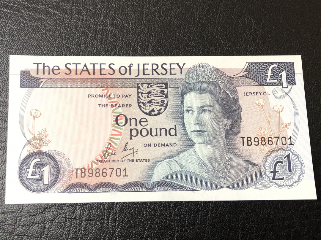 《外钞收藏家》第七十五期拍卖目录 泽西1镑 背面精美系列之一 全新unc