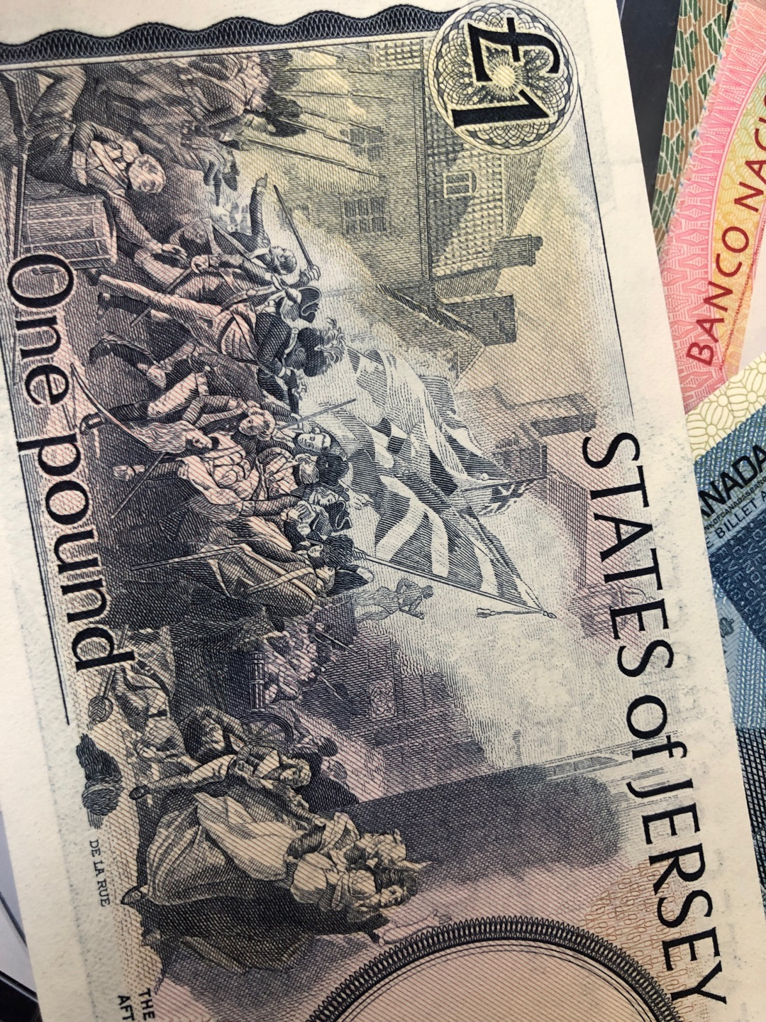 《外钞收藏家》第七十五期拍卖目录 泽西1镑 背面精美系列之一 全新unc