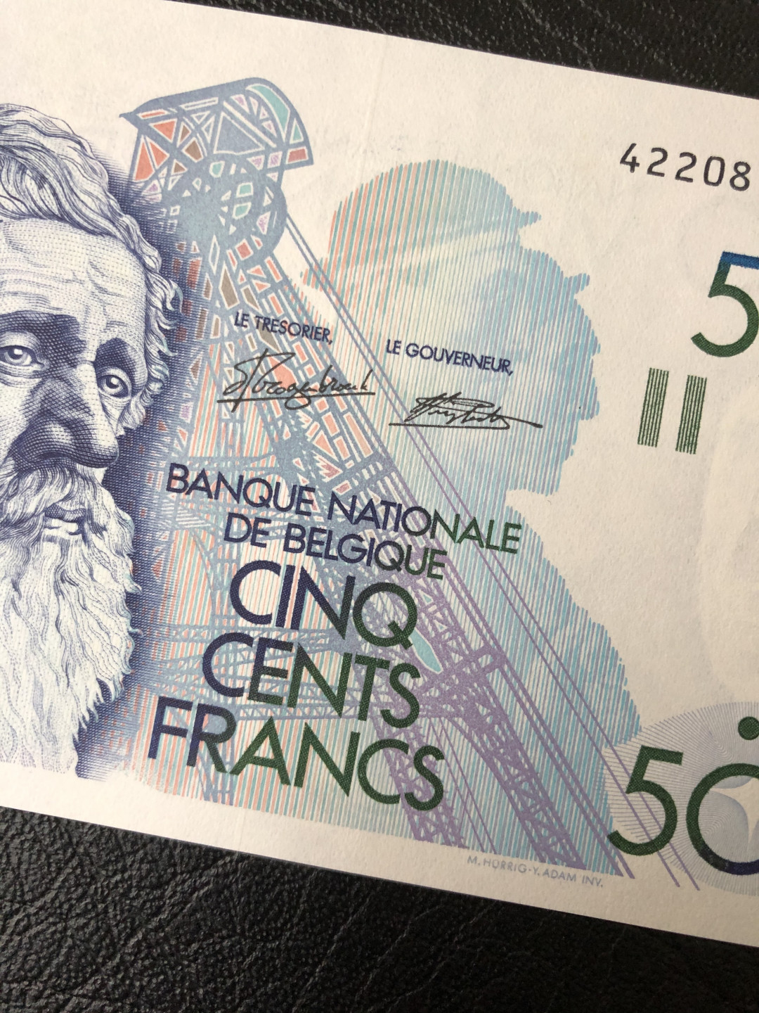 《外钞收藏家》第七十五期拍卖目录 比利时倒二版 500法郎 轻微受潮 其他没问题 见荧光 非常漂亮经典的一版 