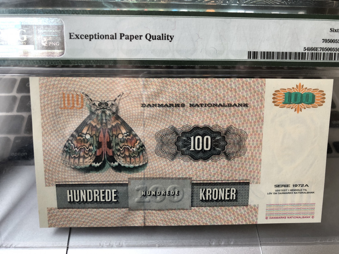 《外钞收藏家》第七十五期拍卖目录 丹麦动物版 1998年100克朗 pmg66 颜色非常漂亮的蛾子