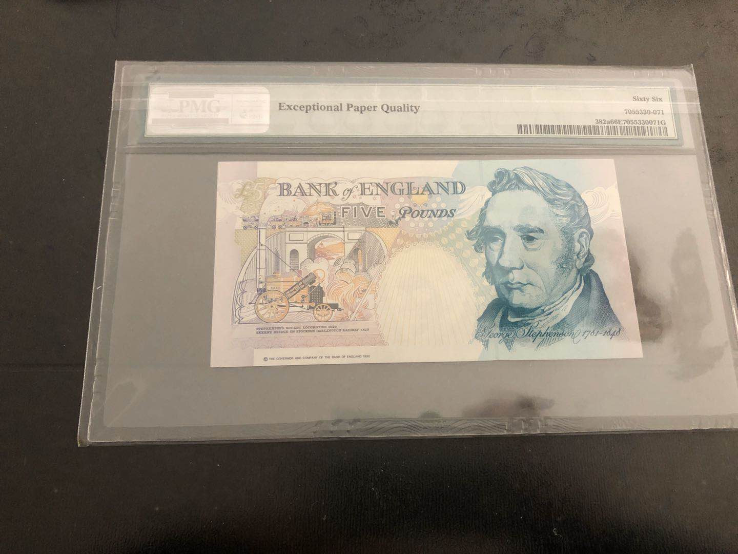 【收藏联盟】第121期拍卖——现代戏剧之父 【皇冠版A01首发冠】英国 1990年 5镑 p382a PMG66EPQ  Gill签名 女王