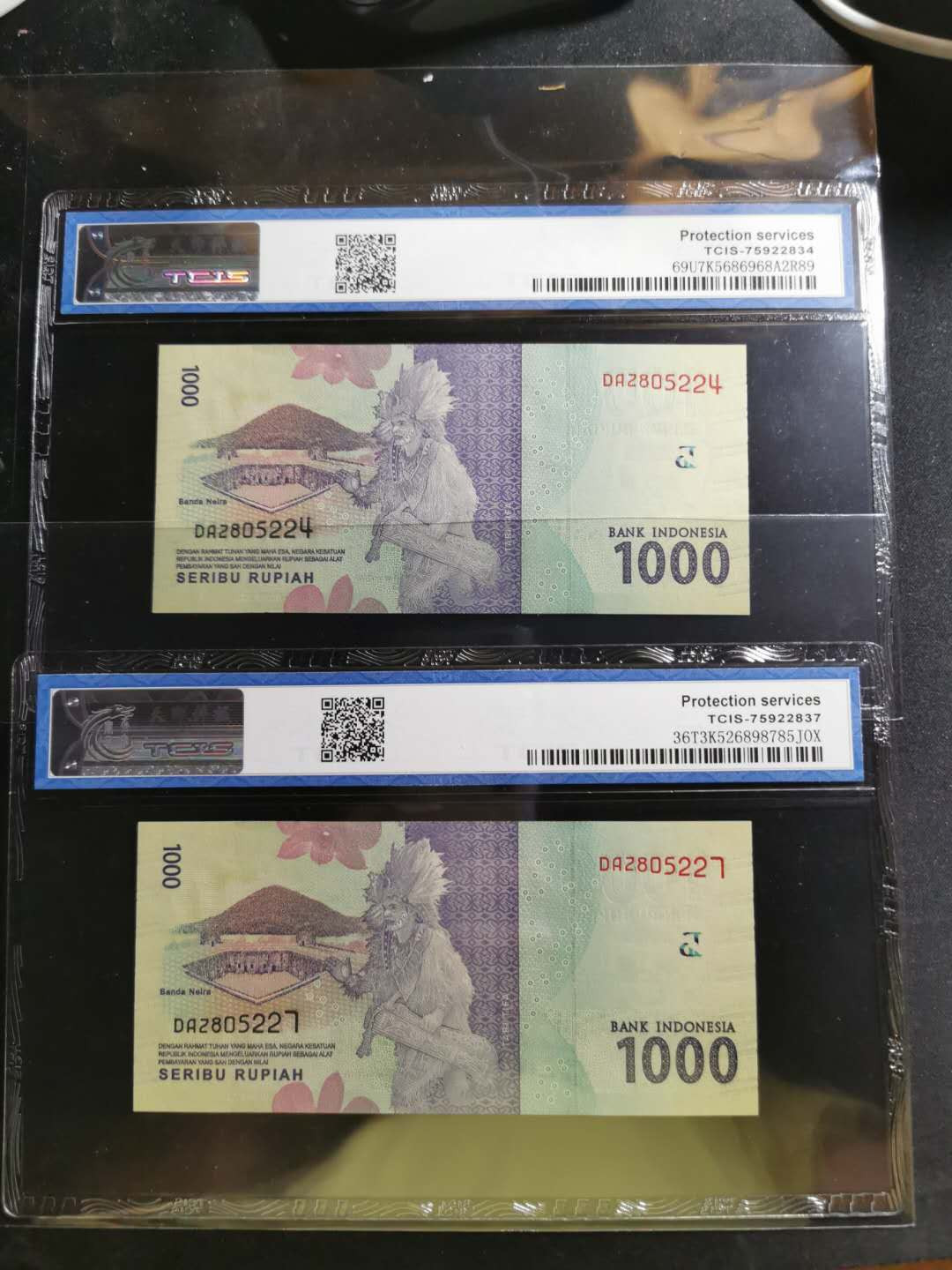 【鲸贝乐淘】千字文·第“鸣凤在竹”号拍卖  【印度尼西亚】2016年1000卢比2张，天印评级68E