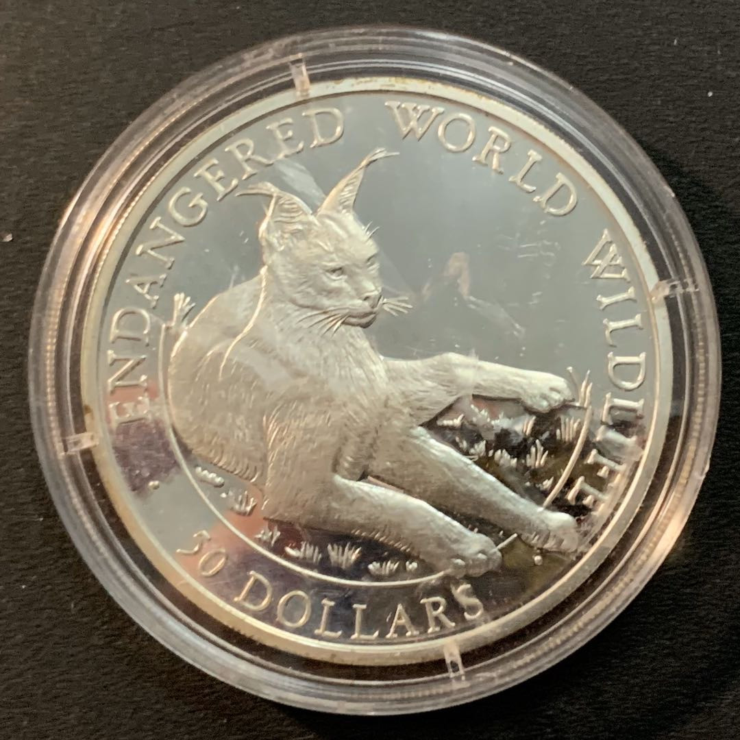 紫瑗钱币—微拍第32期  库克群岛 1990年 世界濒危野生动物系列 折耳猫 50元 19.8克 0.925银 精制