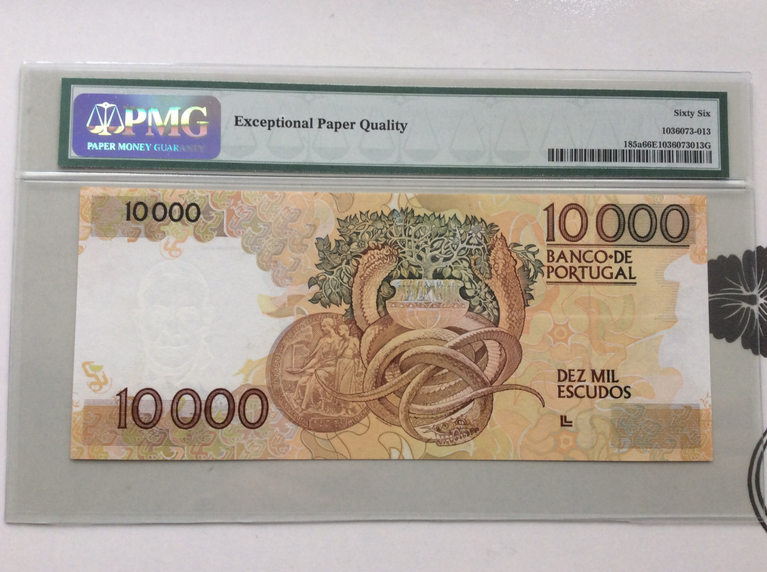 【收藏联盟】第124期拍卖——征服者科尔特斯（共50拍） 葡萄牙 1989年 10000埃斯库多 PMG66EPQ  p185a  正面：葡萄牙精神病学家、1949年诺贝尔生理学或医学奖得主安东尼奥•埃加斯•莫尼斯、成人大脑组织、Ch.1系列 背面：诺贝尔奖章、三蛇和树组成的图案