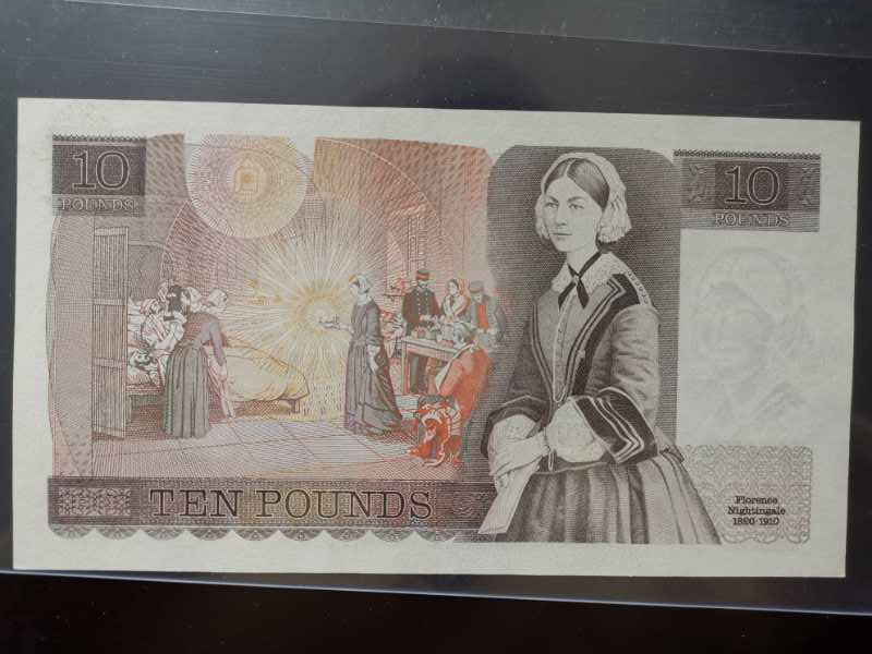 【收藏联盟】第124期拍卖——征服者科尔特斯（共50拍） 英国 D序列10镑纸币（南丁格尔 ）首签page稀少 双雕版本 无折无斑 全新UNC（一个角有轻微自然磨损）