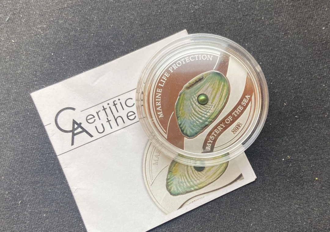 【币观天下】第九十九期钱币拍卖 【帕劳】2012年帕劳绿色珍珠钱币