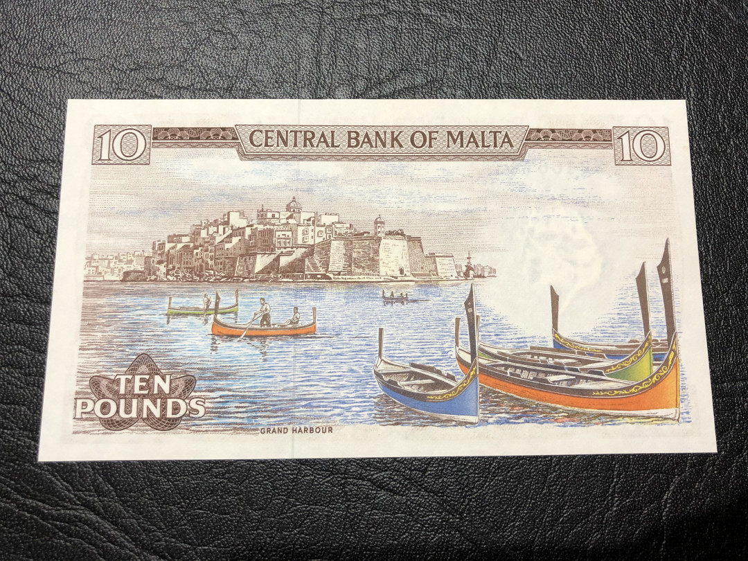 《外钞收藏家》第七十六期拍卖 马耳他彩背1镑 近全新品相  无折  无黄斑 荧光有斑  稀少品种