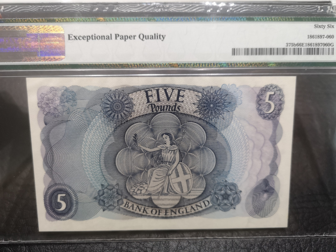 《外钞收藏家》第七十六期拍卖 英国C序列5镑 pmg66  经典版