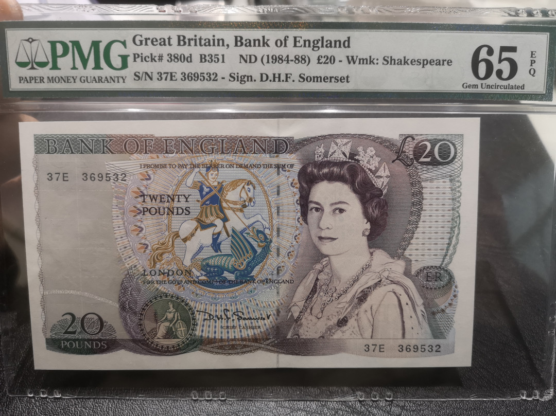 《外钞收藏家》第七十六期拍卖 英国D序列20镑 pmg65  大票幅 莎士比亚水印