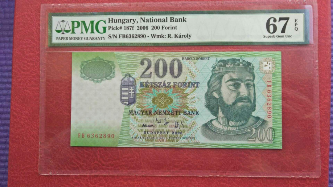 《外钞收藏家》第七十六期拍卖 匈牙利2006年200pmg67和500福林pmg66 一共两张