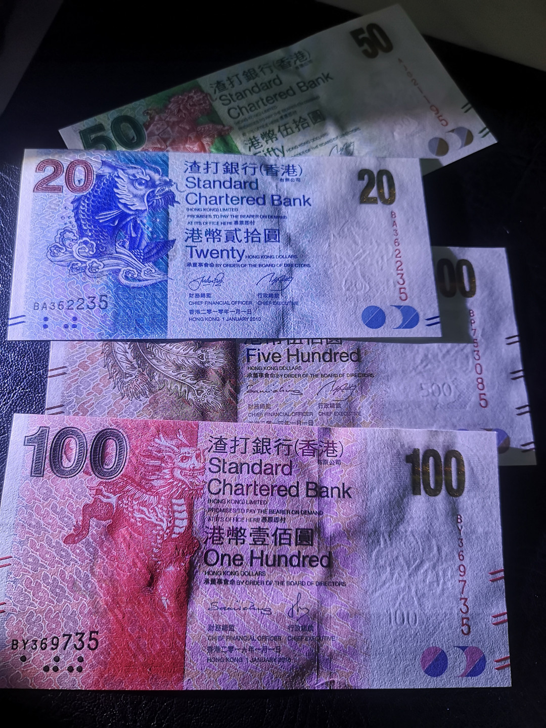 《外钞收藏家》第七十六期拍卖 渣打银行倒二版500、100、50、20四张 全新绝品