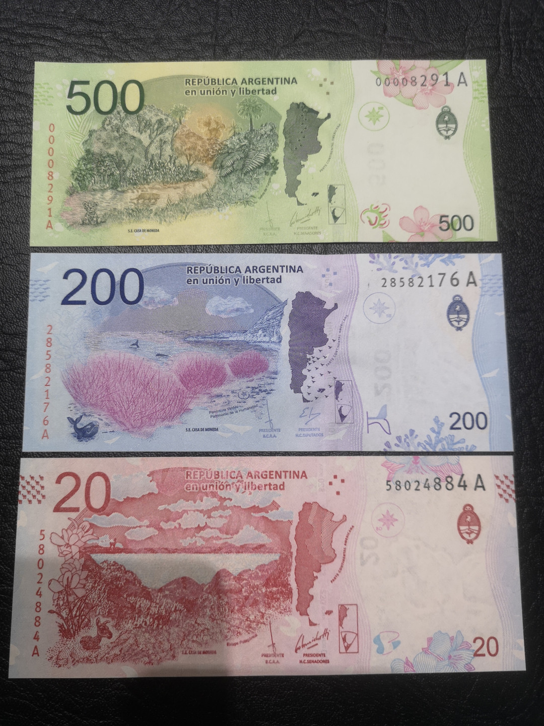 《外钞收藏家》第七十六期拍卖 阿根廷最新版500、200、20三张 小套  张张设计精美  全新绝品