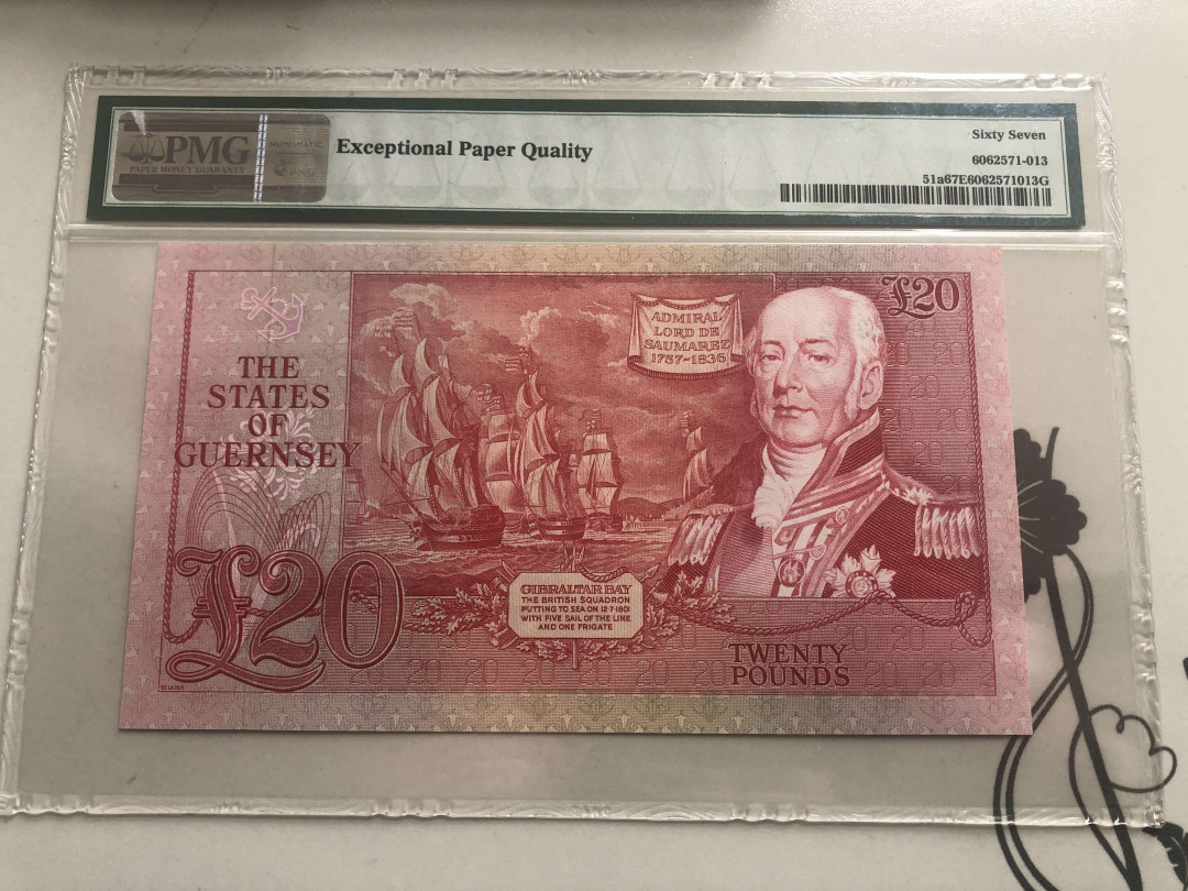 【收藏联盟】第126期拍卖——数字迷踪（共45拍） 【A冠322小号】根西 1980-89年 20镑 PMG67EPQ 高分