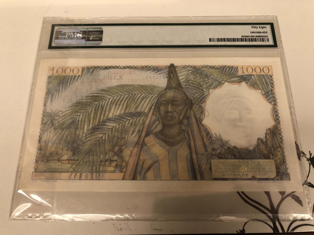 【收藏联盟】第128期拍卖——北爱遗珍（共50拍） 法属西非 1945-54年 1000法郎 p42 PMG58 稀少