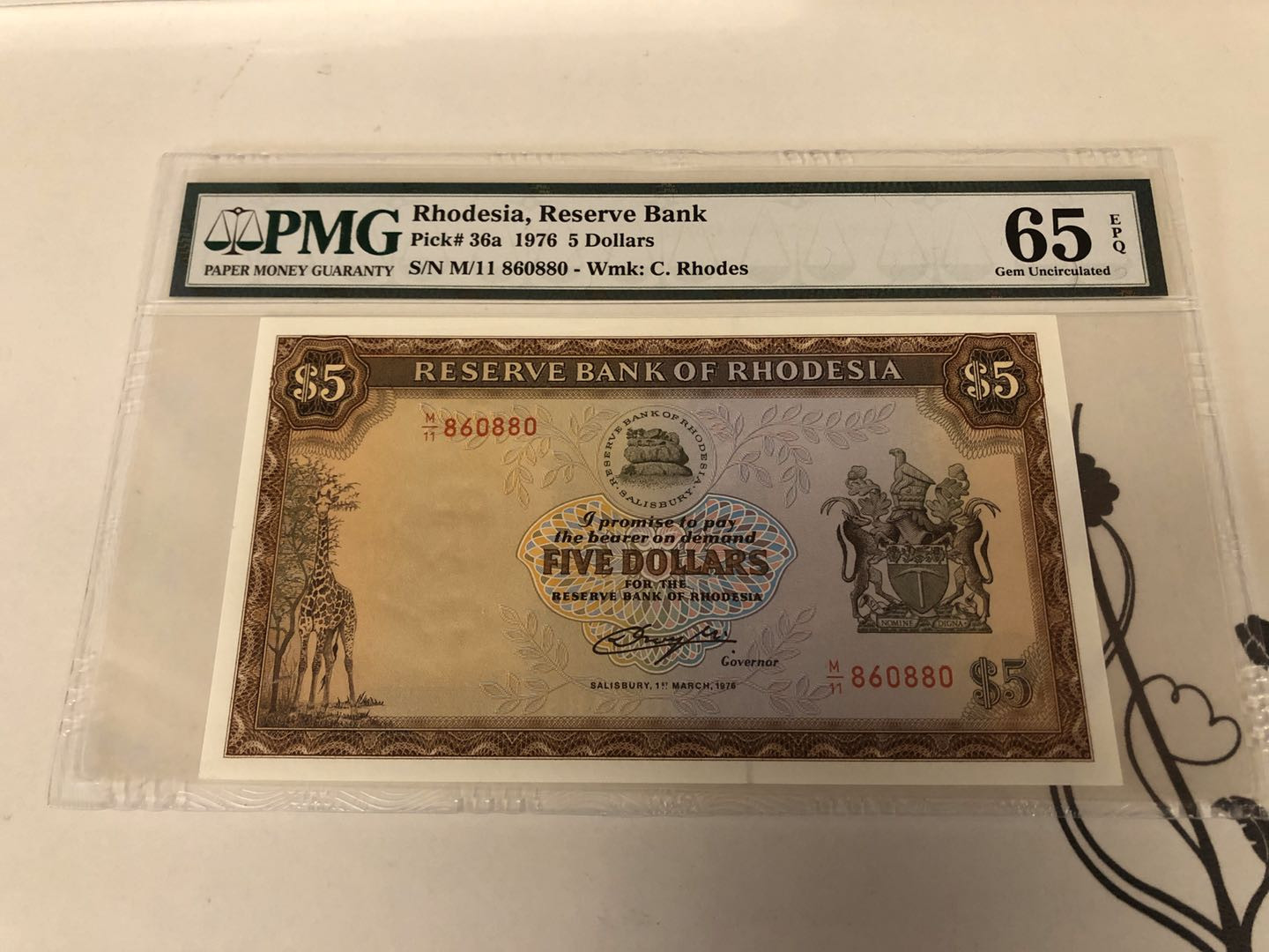 【收藏联盟】第128期拍卖——北爱遗珍（共50拍） 罗德西亚1978年5元 P-36a  PMG65EPQ  狮子王