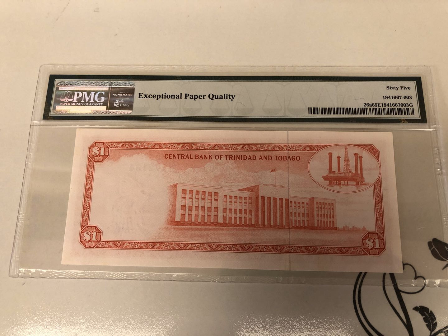 【收藏联盟】第128期拍卖——北爱遗珍（共50拍） 特立尼达和多巴哥 1964年1元 PMG65EPQ 女王纸币