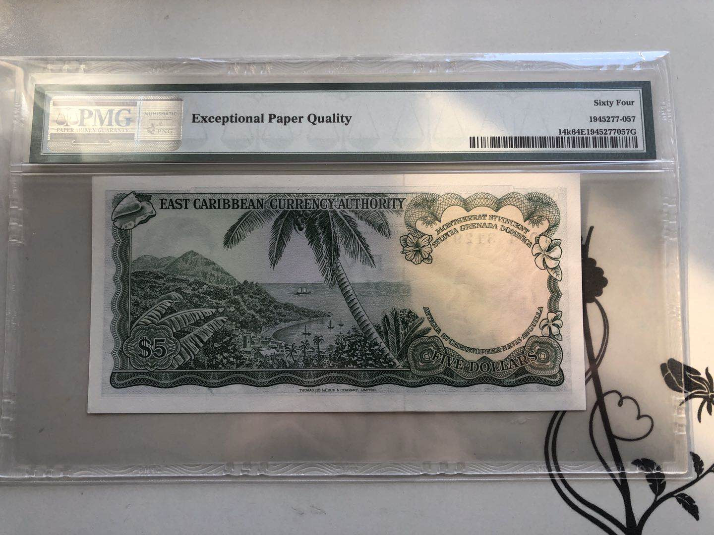 【收藏联盟】第128期拍卖——北爱遗珍（共50拍） 东加勒比 1965年5元 PMG64EPQ 戎装女王