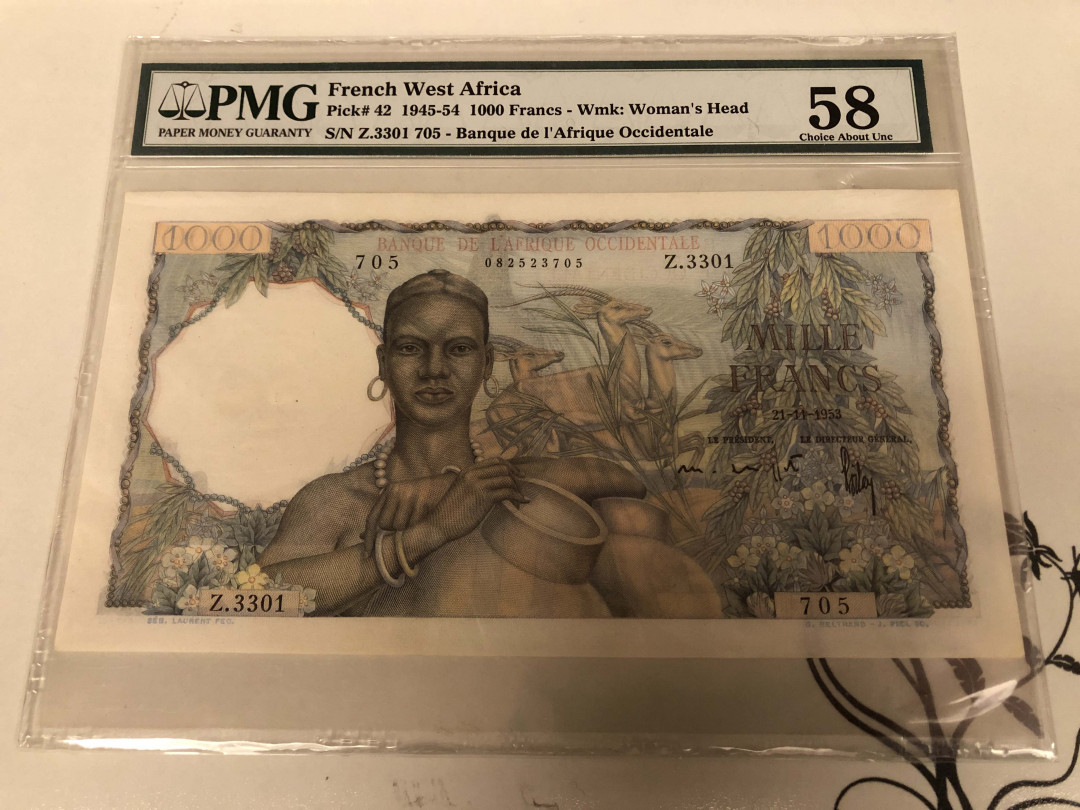 【收藏联盟】第128期拍卖——北爱遗珍（共50拍） 法属西非 1945-54年 1000法郎 p42 PMG58 稀少