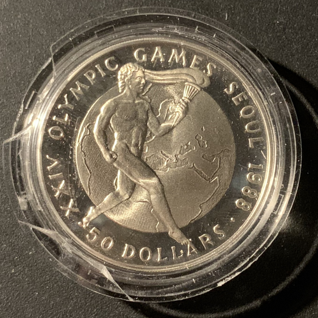 紫瑗钱币—微拍第37期  库克群岛 1987年 汉城奥运会 火炬 50元 28.28克 0.925银 精制