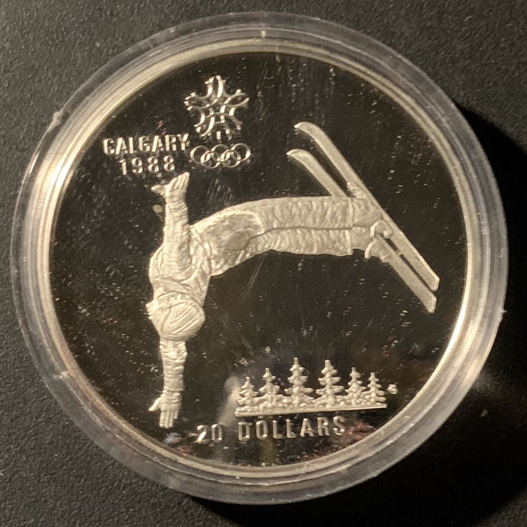 紫瑗钱币—微拍第37期  加拿大 1986年 卡尔加里冬奥会 高台滑雪 20元  34.1克 0.925银 精制