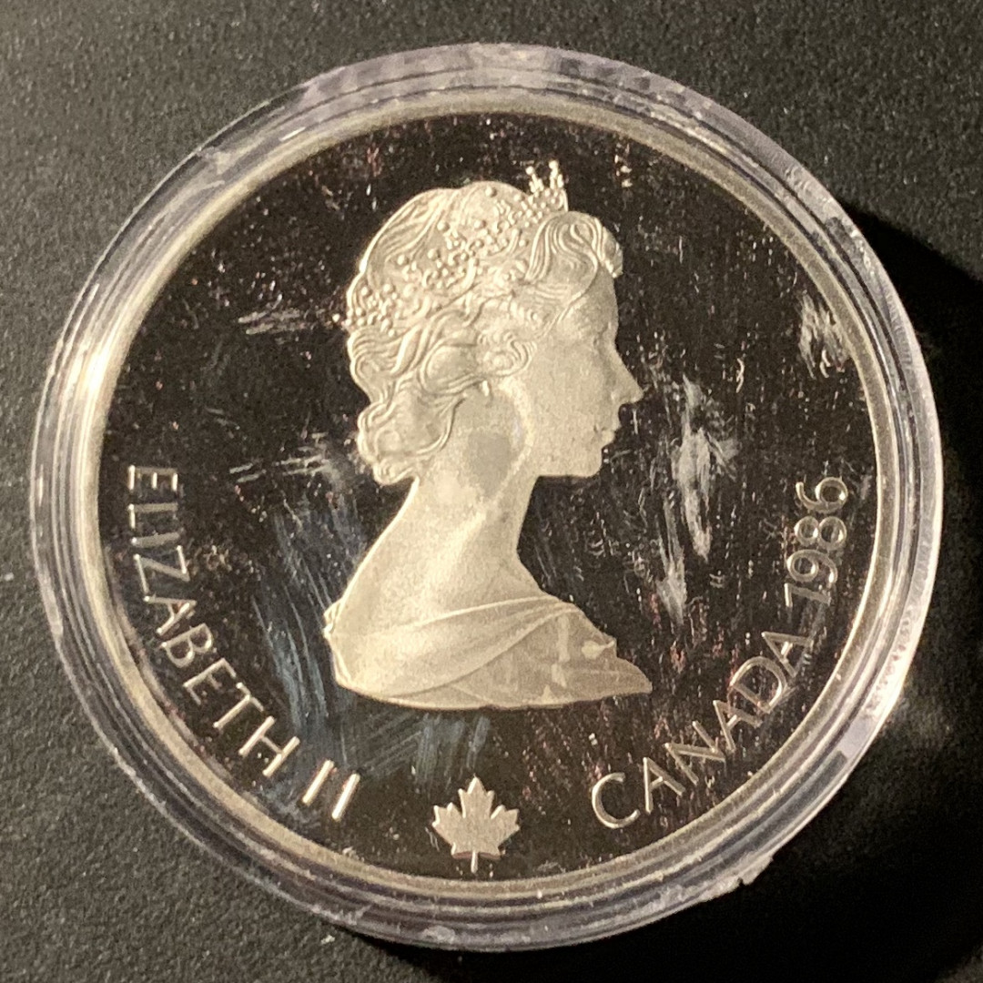 紫瑗钱币—微拍第37期  加拿大 1986年 卡尔加里冬奥会 冰球 20元  34.1克 0.925银 精制