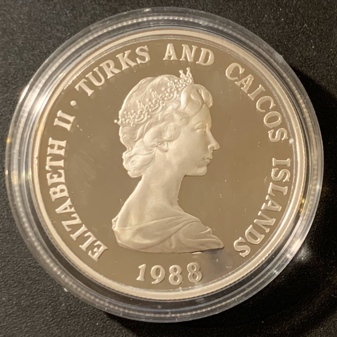 紫瑗钱币—微拍第38期  特克斯与凯恩斯 1988年 WWF25周年 特克斯巨蜥 1克朗 28.28克 0.925银 精制