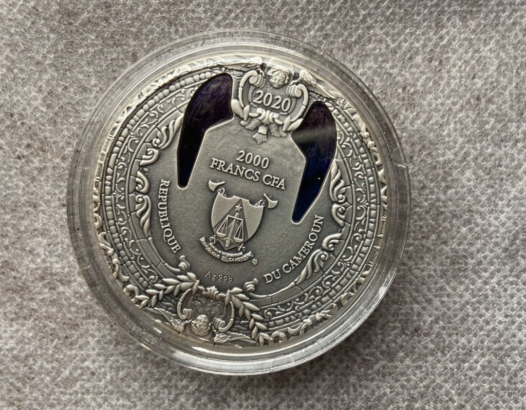 【币观天下】第101期钱币拍卖 【喀麦隆】喀麦隆镶嵌玻璃系列第一枚：大天使加百列