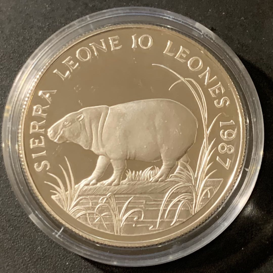 紫瑗钱币—微拍第38期  塞拉利昂 1987年  野生动物系列 侏儒河马 10利昂 28.28克 0.925银 精制