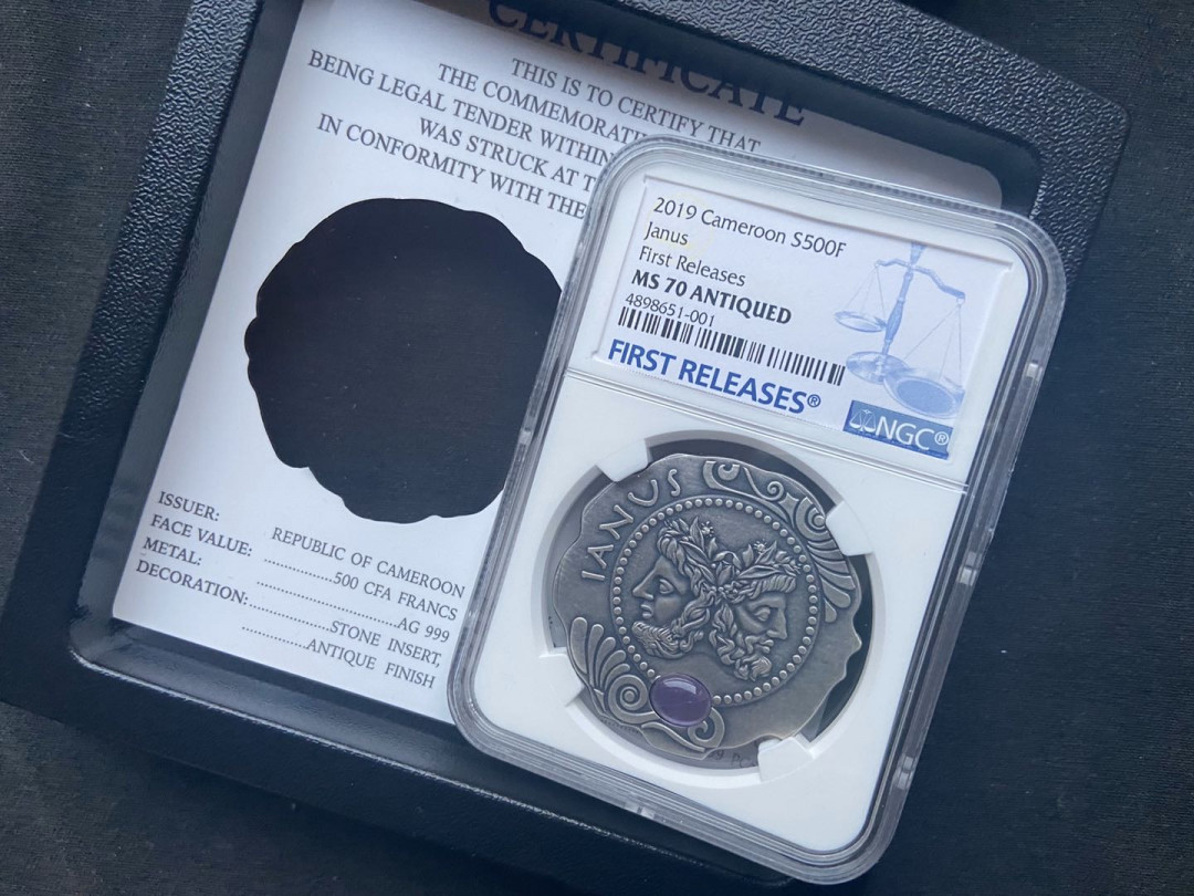 【币观天下】第101期钱币拍卖 【喀麦隆】双面门神镶嵌石头【ngc70】