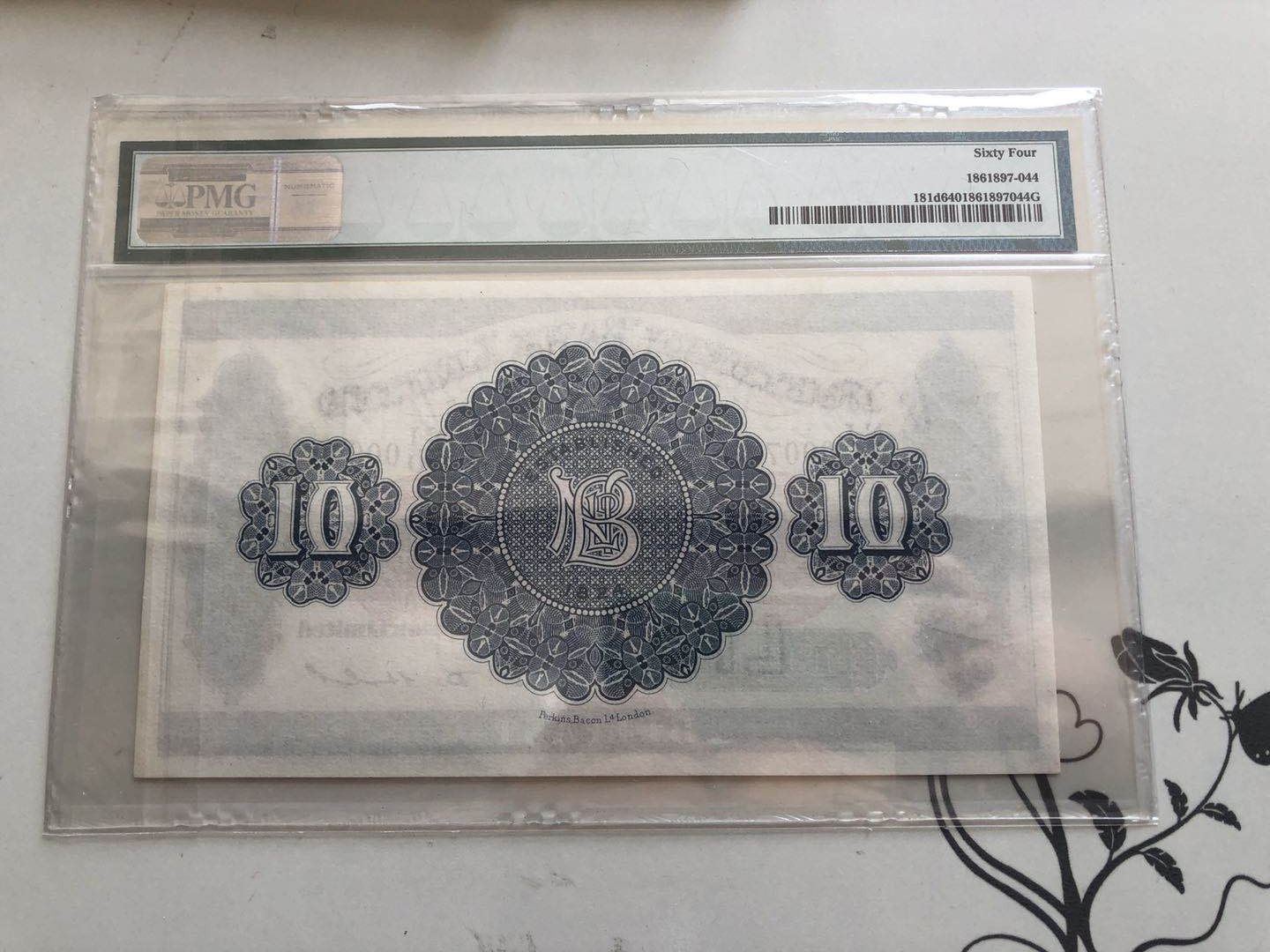 【收藏联盟】第129期拍卖——撒哈拉的黑珍珠（共50拍） 【70号小号】北爱尔兰 1968年 10镑 PMG64 稀少