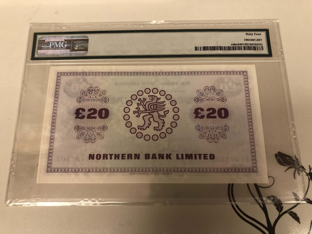 【收藏联盟】第129期拍卖——撒哈拉的黑珍珠（共50拍） 北爱尔兰 1987年 20镑 PMG64 BWC出品 