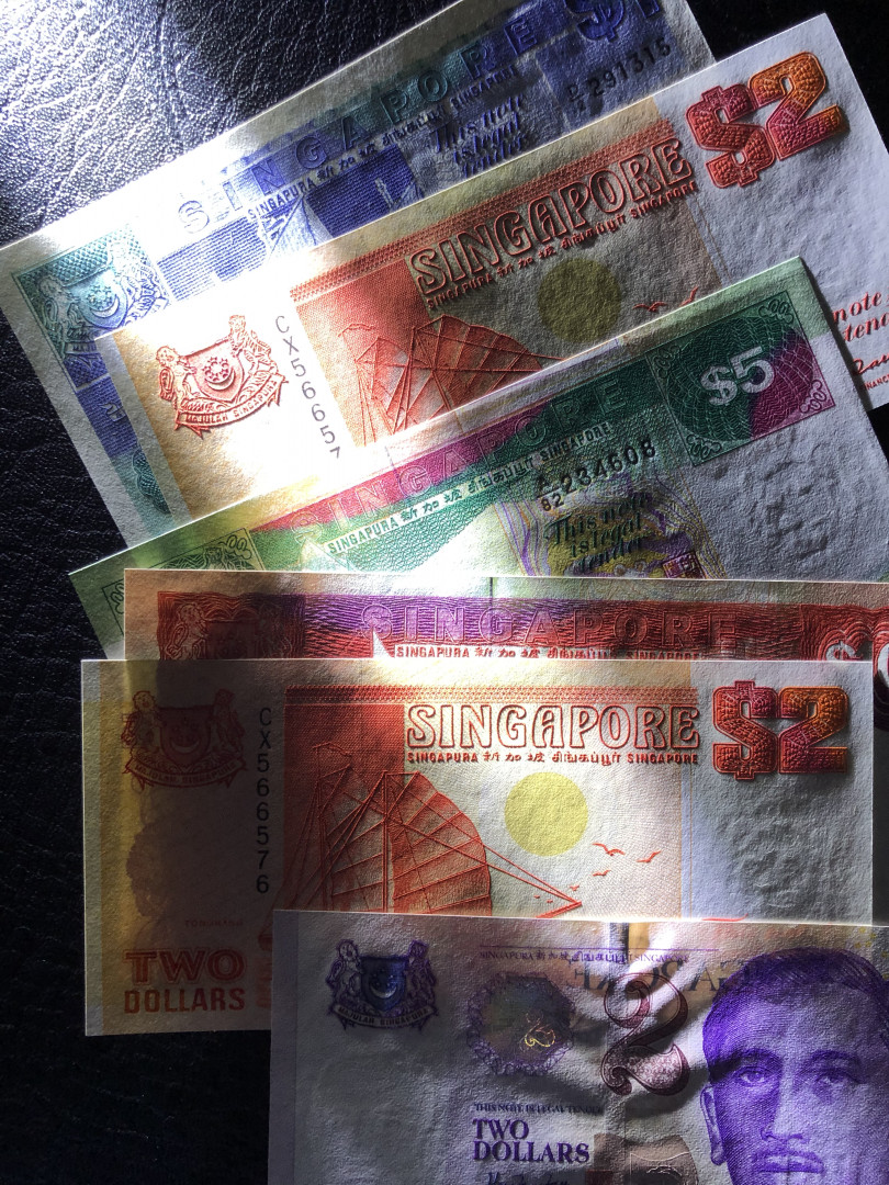 《外钞收藏家》第七十七期拍卖 新加坡船版 1、2、5、10 全新unc