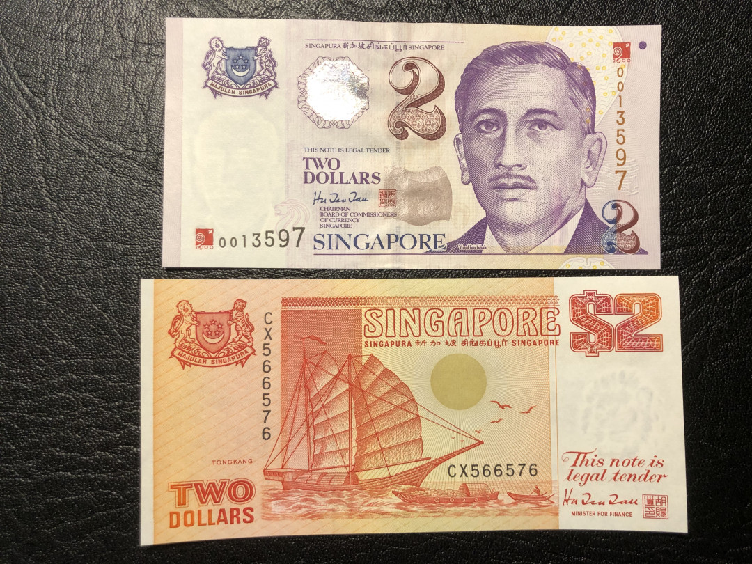 《外钞收藏家》第七十七期拍卖 新加坡船版2元、塑料钞2元 全新品相